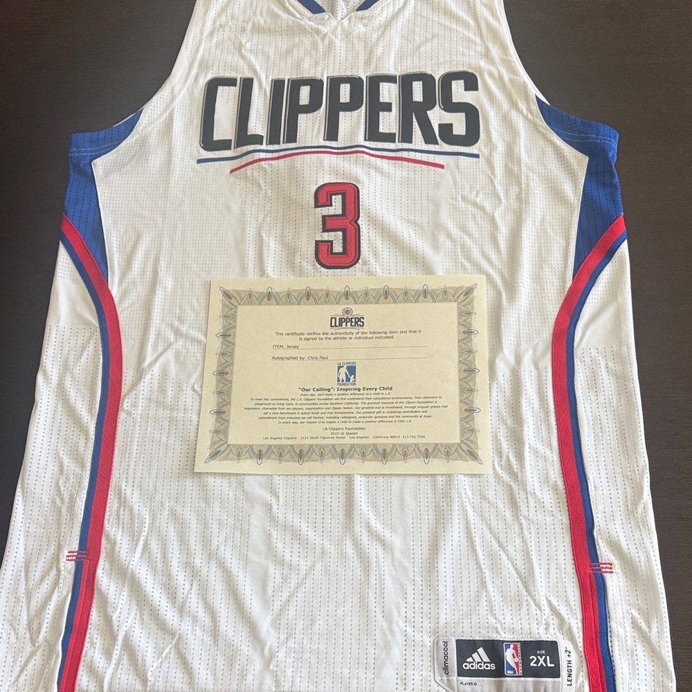 Authentic Signed Chris Paul Clippers Jersey in White with Blue and Red